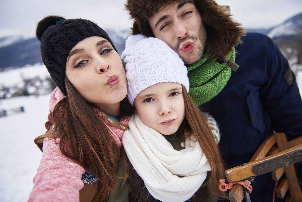 Family making funny faces in front of the camera
